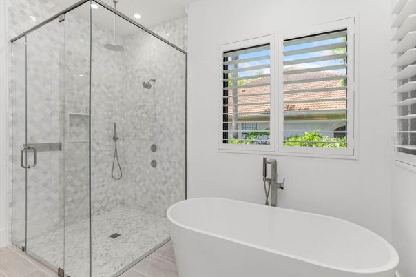 Bathroom, Free Standing Baths, Glass Shower, Interior, Marble Walls, Recessed Lighting