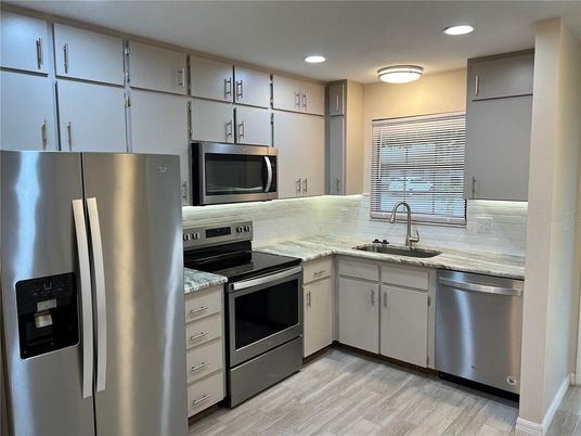Interior, Kitchen, Recessed Lighting, Stainless Steel Appliances, Wood Texture Flooring