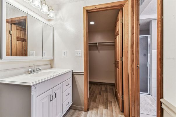 Bathroom, Interior, Recessed Lighting, Walk-in Closets, Wood Texture Flooring