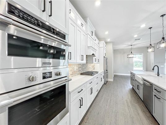 Interior, Kitchen, Pendant Lights, Recessed Lighting, Stainless Steel Appliances, Wood Texture Flooring
