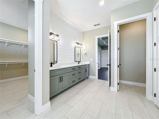 Bathroom, Dual Sink Vanities, Interior, Recessed Lighting, Wood Texture Flooring
