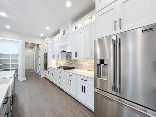 Interior, Kitchen, Recessed Lighting, Stainless Steel Appliances, Wood Texture Flooring