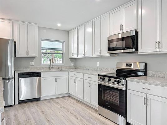 Interior, Kitchen, Recessed Lighting, Stainless Steel Appliances, Wood Texture Flooring