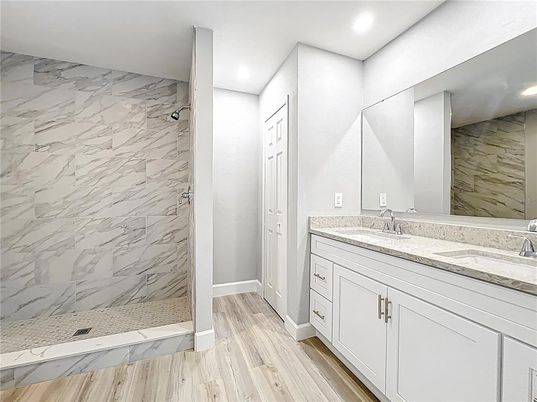 Bathroom, Interior, Marble Walls, Recessed Lighting, Wood Texture Flooring