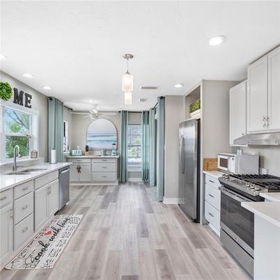 Interior, Kitchen, Pendant Lights, Recessed Lighting, Stainless Steel Appliances, Wood Texture Flooring