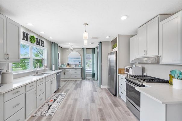 Interior, Kitchen, Pendant Lights, Recessed Lighting, Stainless Steel Appliances, Wood Texture Flooring