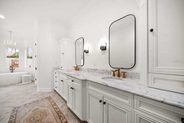 Bathroom, Chandelier, Dual Sink Vanities, Free Standing Baths, Interior, Recessed Lighting