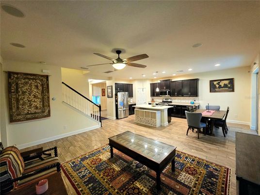 Dining room, Interior, Kitchen, Pendant Lights, Recessed Lighting, Stainless Steel Appliances, Wood Texture Flooring