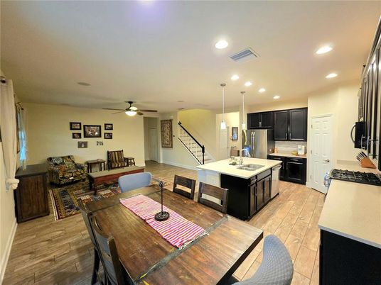 Dining room, Interior, Kitchen, Living room, Pendant Lights, Recessed Lighting, Stainless Steel Appliances, Wood Texture Flooring