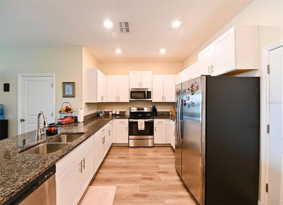 Interior, Kitchen, Recessed Lighting, Stainless Steel Appliances, Wood Texture Flooring