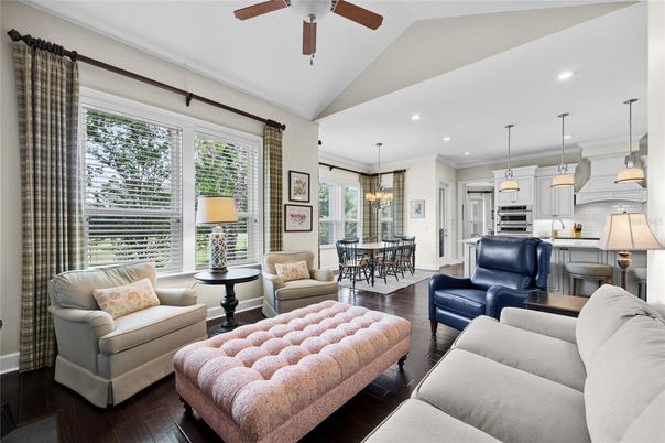 Chandelier, Dining room, Interior, Kitchen, Living room, Pendant Lights, Recessed Lighting, Stainless Steel Appliances, Wood Texture Flooring