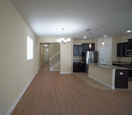 Chandelier, Interior, Kitchen, Pendant Lights, Recessed Lighting, Stainless Steel Appliances, Wood Texture Flooring