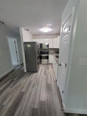 Interior, Kitchen, Stainless Steel Appliances, Wood Texture Flooring