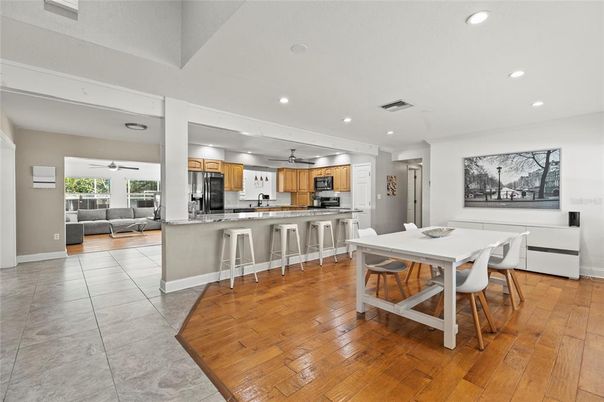 Dining room, Interior, Kitchen, Recessed Lighting, Stainless Steel Appliances, Wood Texture Flooring