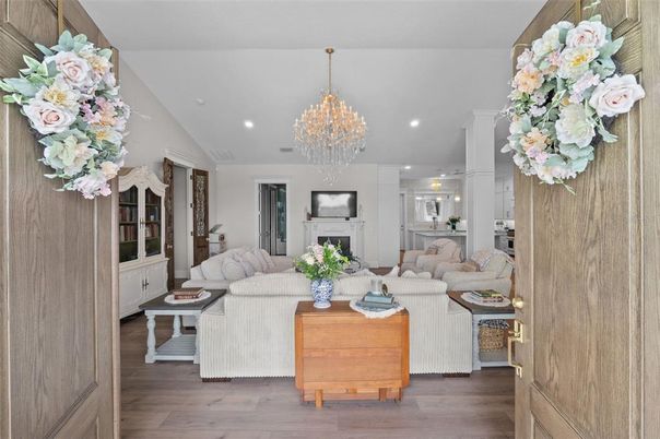 Chandelier, Fireplace, Interior, Living room, Recessed Lighting, Wood Texture Flooring