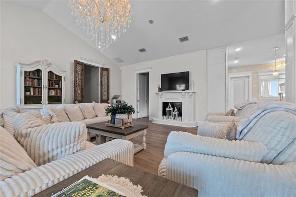 Chandelier, Fireplace, Interior, Living room, Recessed Lighting, Wood Texture Flooring
