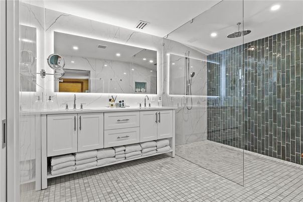 Bathroom, Dual Sink Vanities, Glass Shower, Interior, Marble Walls, Recessed Lighting