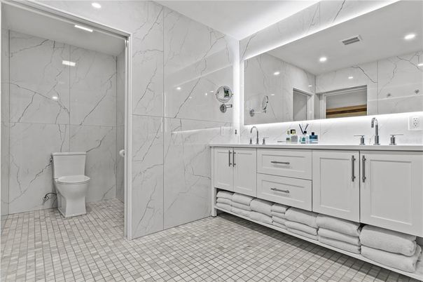 Bathroom, Dual Sink Vanities, Interior, Marble Walls, Recessed Lighting