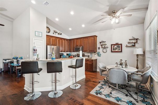 Dining room, Interior, Kitchen, Recessed Lighting, Stainless Steel Appliances, Wood Texture Flooring