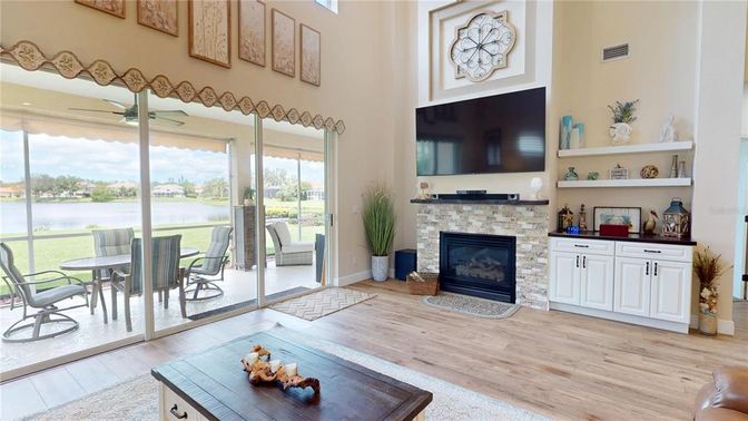 Fireplace, Interior, Sun Room, Water, Wood Texture Flooring