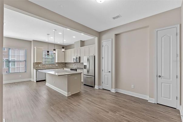 Interior, Kitchen, Pendant Lights, Recessed Lighting, Stainless Steel Appliances, Wood Texture Flooring