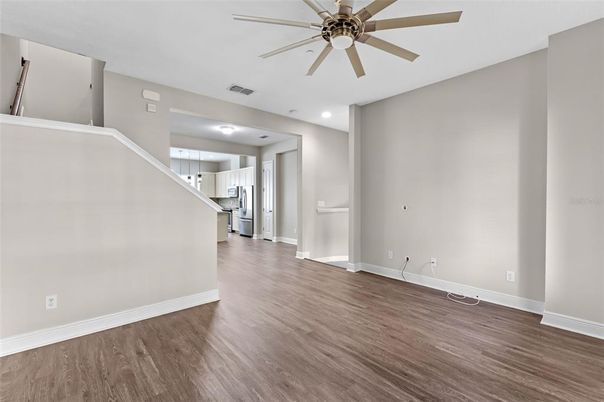 Empty room, Interior, Recessed Lighting, Stainless Steel Appliances, Wood Texture Flooring