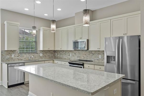 Interior, Kitchen, Pendant Lights, Recessed Lighting, Stainless Steel Appliances, Wood Texture Flooring