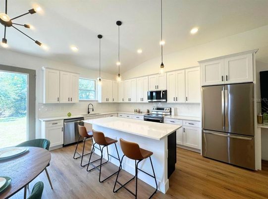 Interior, Kitchen, Pendant Lights, Recessed Lighting, Stainless Steel Appliances, Wood Texture Flooring