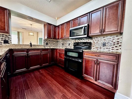 Interior, Kitchen, Pendant Lights, Stainless Steel Appliances, Wood Texture Flooring