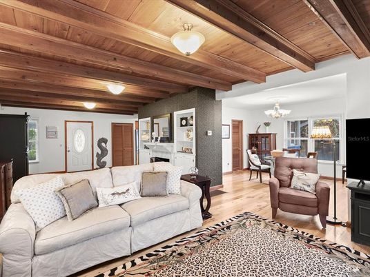 Chandelier, Dining room, Fireplace, Interior, Living room, Wooden Beams, Wooden Ceilings, Wood Texture Flooring