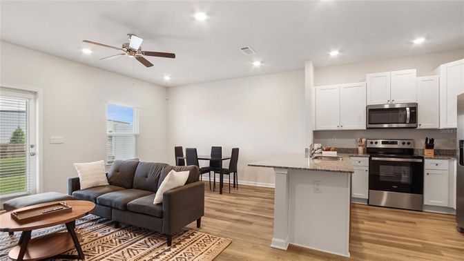 Dining room, Interior, Kitchen, Recessed Lighting, Stainless Steel Appliances, Wood Texture Flooring