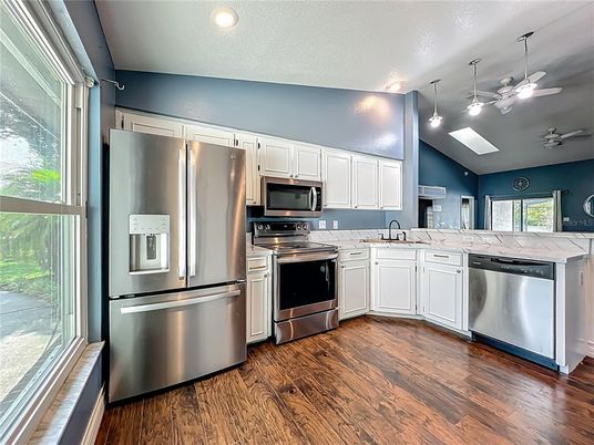 Interior, Kitchen, Recessed Lighting, Stainless Steel Appliances, Wood Texture Flooring