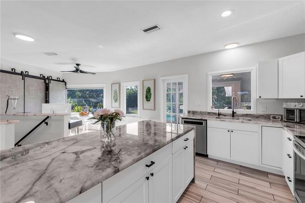Interior, Kitchen, Recessed Lighting, Stainless Steel Appliances, Wood Texture Flooring