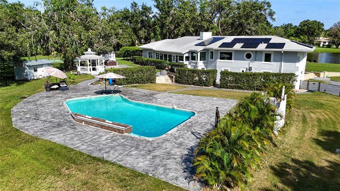 Exterior, Pool, Solar Panels