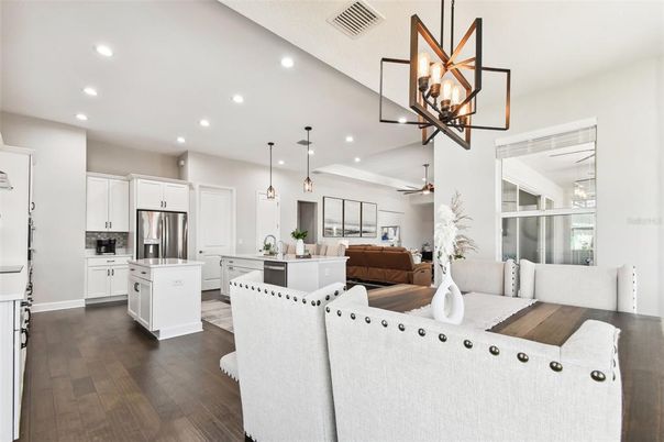 Dining room, Interior, Kitchen, Living room, Pendant Lights, Recessed Lighting, Stainless Steel Appliances, Wood Texture Flooring