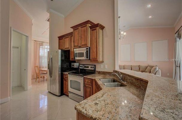 Chandelier, Dining room, Interior, Kitchen, Pendant Lights, Recessed Lighting, Stainless Steel Appliances