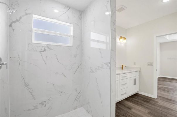 Bathroom, Interior, Marble Walls, Recessed Lighting, Wood Texture Flooring