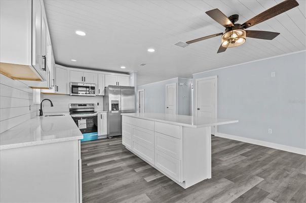 Interior, Kitchen, Recessed Lighting, Stainless Steel Appliances, Wood Texture Flooring