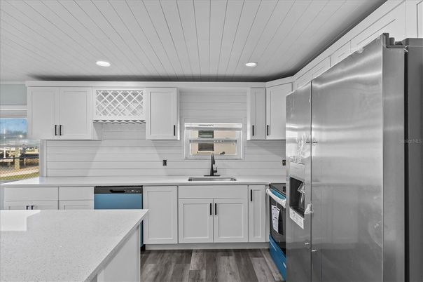 Interior, Kitchen, Recessed Lighting, Stainless Steel Appliances, Wood Texture Flooring