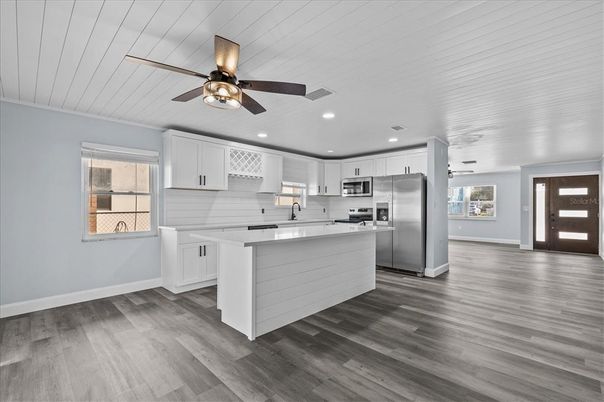 Interior, Kitchen, Recessed Lighting, Stainless Steel Appliances, Wood Texture Flooring