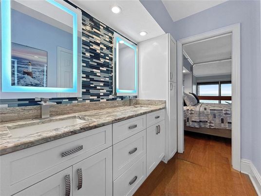 Bathroom, Bedroom, Dual Sink Vanities, Interior, Recessed Lighting, Wood Texture Flooring