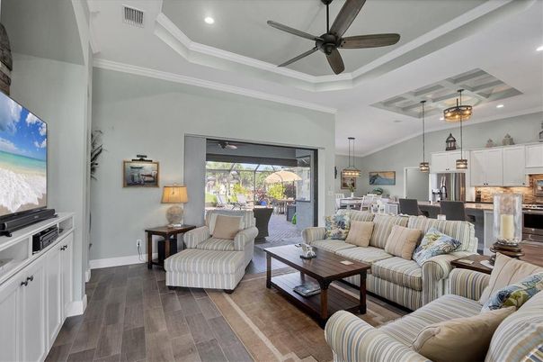 Dining room, Interior, Kitchen, Living room, Pendant Lights, Recessed Lighting, Stainless Steel Appliances, Wood Texture Flooring