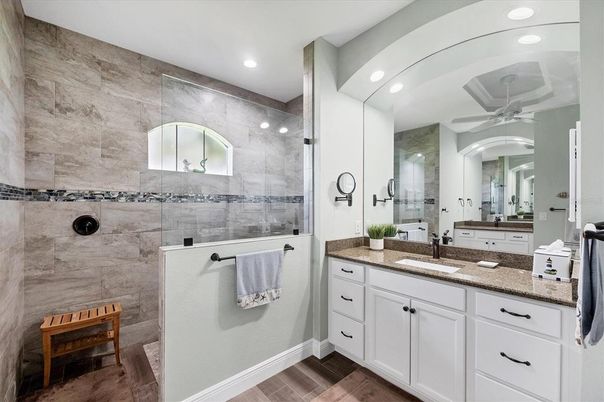 Bathroom, Dual Sink Vanities, Glass Shower, Interior, Recessed Lighting, Wood Texture Flooring