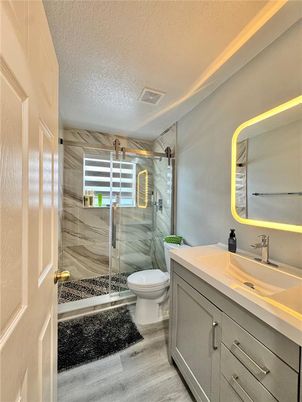 Bathroom, Glass Shower, Interior, Marble Walls, Wood Texture Flooring