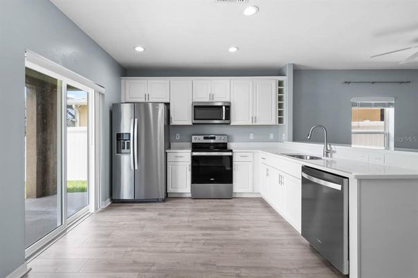Interior, Kitchen, Recessed Lighting, Stainless Steel Appliances, Wood Texture Flooring