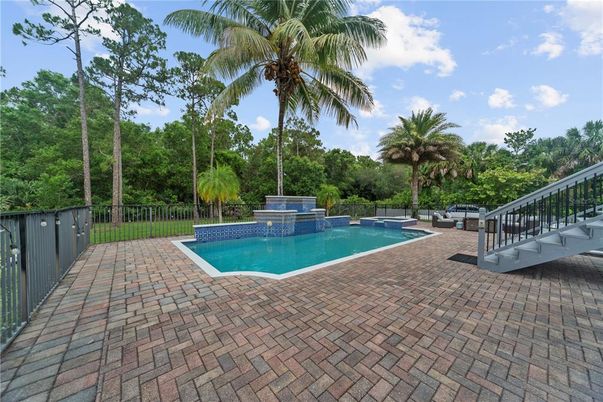 Exterior, Fireplace, Pool