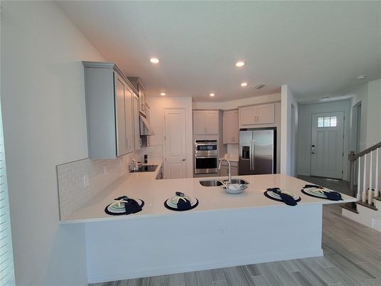 Interior, Kitchen, Recessed Lighting, Stainless Steel Appliances, Wood Texture Flooring