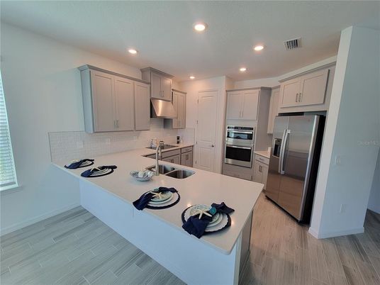 Interior, Kitchen, Recessed Lighting, Stainless Steel Appliances, Wood Texture Flooring