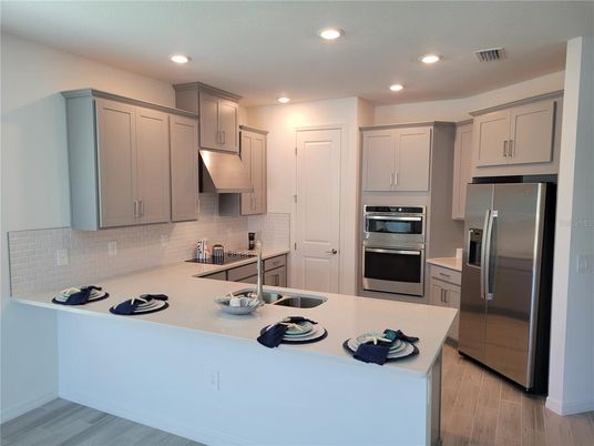 Interior, Kitchen, Recessed Lighting, Stainless Steel Appliances, Wood Texture Flooring