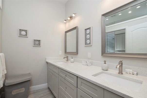Bathroom, Dual Sink Vanities, Interior, Recessed Lighting, Wood Texture Flooring